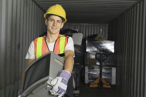 Workers sorting builders waste on-site in Chiswick