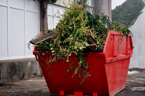 Professional garden clearance equipment in Chiswick